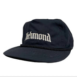 Black cap with 'Richmond' text on a white background