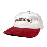 White and red cap with 'Richmond' text on a gray background