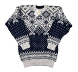 Navy and white patterned sweater on a white background