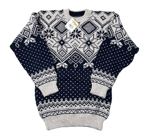 Navy and white patterned sweater on a white background