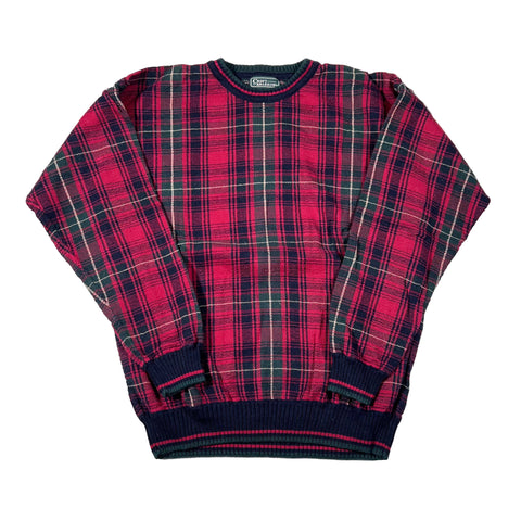 Red and green plaid sweater on a white background