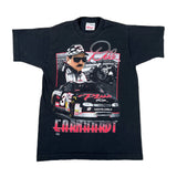 A black short-sleeve graphic T-shirt laid flat on a light background, featuring a large front print of a race car and a driver with the text 'Rice' and 'Carnahan' in red and white.