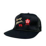 Black trucker cap with embroidered text and logo on a white background