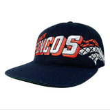 Navy blue cap with red and white text on a white background