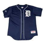 Navy blue baseball jersey with a white logo on a white background