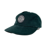 Green cap with a logo on a white background