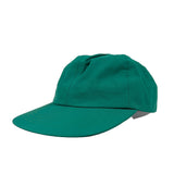 Green cap on a white background