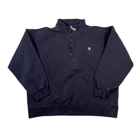 Folded navy blue jacket on a white background