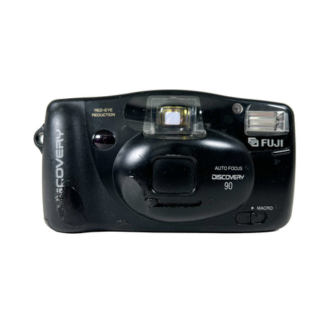 Black Fujifilm camera on a white background