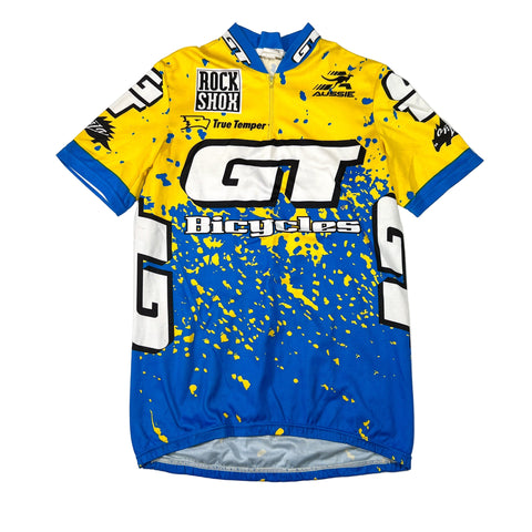 Cycling jersey with blue and yellow design on a white background