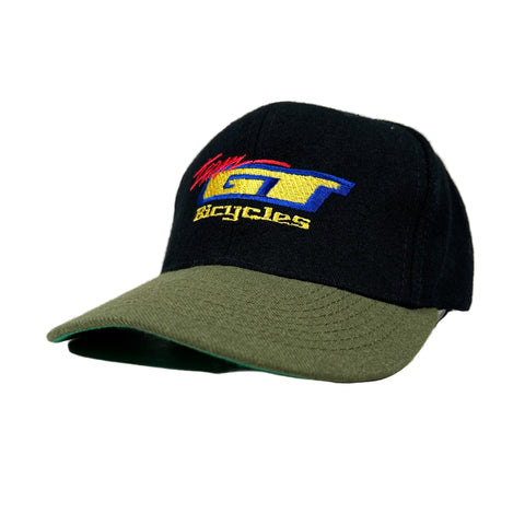 Black and green cap with embroidered logo on a white background