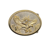 Gold belt buckle with an eagle design on a white background