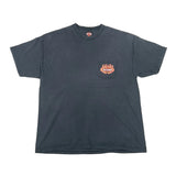 Blue t-shirt with a pocket and flame design on a white background