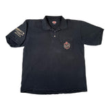 Black polo shirt with logos on a white background