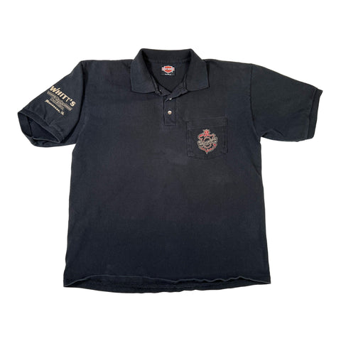 Black polo shirt with logos on a white background