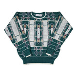 Green sweater with geometric pattern on a white background