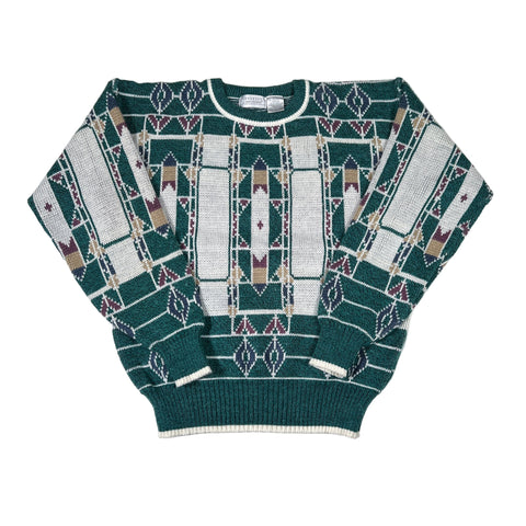 Green sweater with geometric pattern on a white background