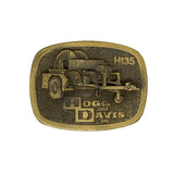 Brass belt buckle with Hogg and Davis Inc. logo on a white background