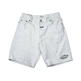 White denim shorts with a small black embroidered logo on the lower left leg, laid flat on a white background.