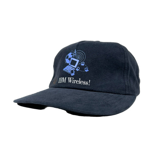 Navy blue cap with IBM Wireless logo on a white background