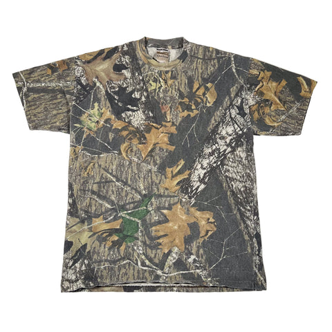 Camouflage-patterned t-shirt on a white background