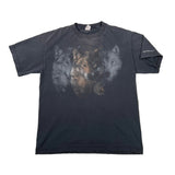 A dark charcoal gray short-sleeve t-shirt with a graphic print of three wolves on the front, laid flat on a white fabric background.