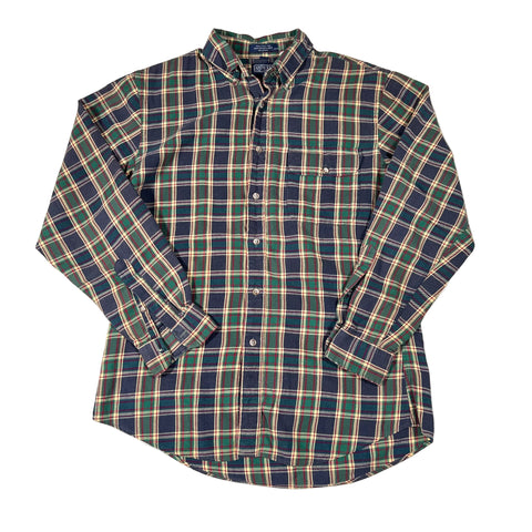 Plaid shirt with green and blue pattern on a white background