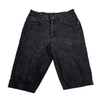 Pair of black denim shorts on a white background