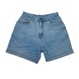 Blue denim shorts on a white background