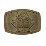 Bronze belt buckle with 'Mack Trucks' logo on a white background