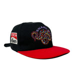 Black and red cap with snake design and Marlboro logo on a white background