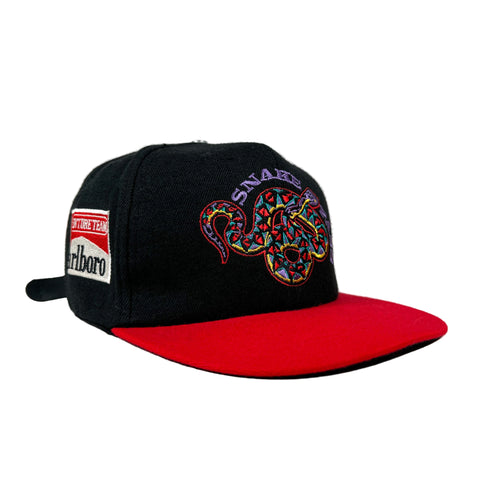 Black and red cap with snake design and Marlboro logo on a white background
