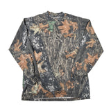 A long-sleeve camouflage shirt with a bark and leaf pattern in brown, gray, and green, laid flat on a white background.