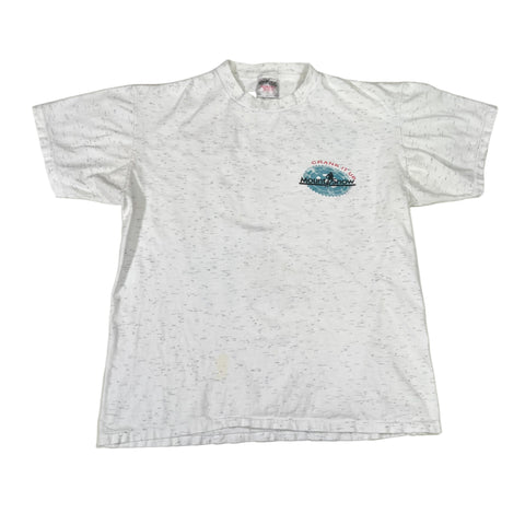 White t-shirt with a colorful graphic on a white background