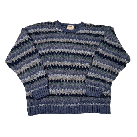 Blue and gray striped sweater on a white background