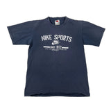 A navy blue short-sleeve t-shirt with white printed graphics and text, laid flat on a white fabric background.