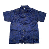 Blue patterned shirt on a white background