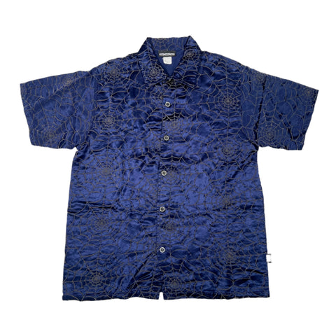 Blue patterned shirt on a white background