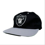 Black cap with Raiders logo on a white background