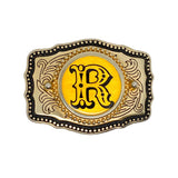 Buckle with decorative border and yellow center on a white background