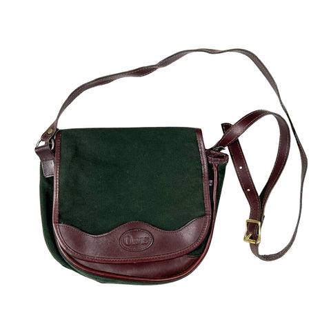 Green and brown leather crossbody bag on a white background
