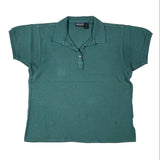 Green polo shirt with a brand logo on a white background