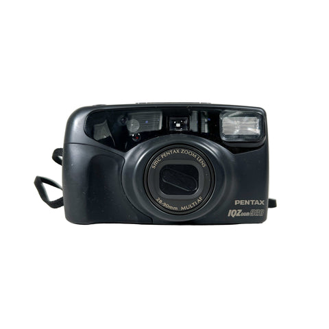Black Pentax camera on a white background