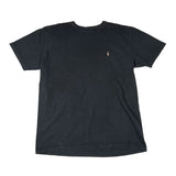 Black t-shirt with a small logo on the chest against a white background