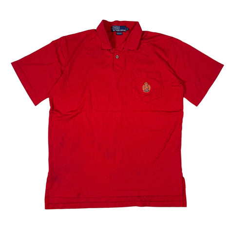 Red polo shirt with a logo on a white background