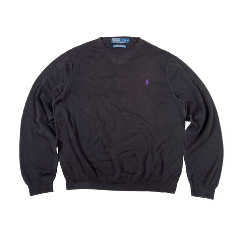 Black sweater with a logo on a white background