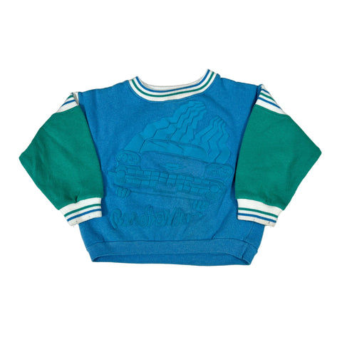 Blue and green sweater with white stripes on a white background