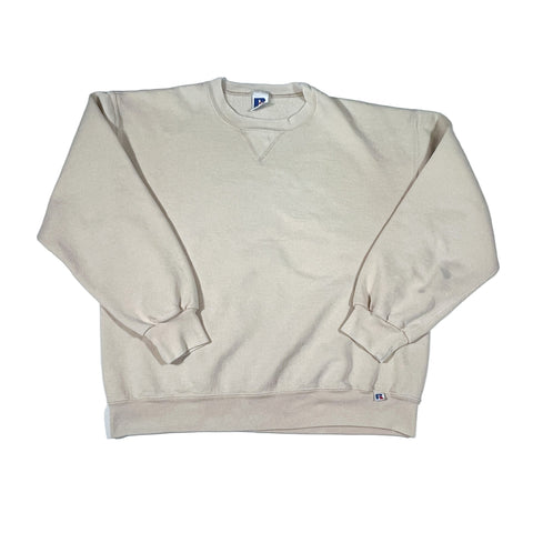 Beige sweatshirt with brand logos on a white background