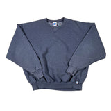 Blue sweatpants with brand logos on a white background