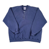 Folded blue sweatshirt on a white background